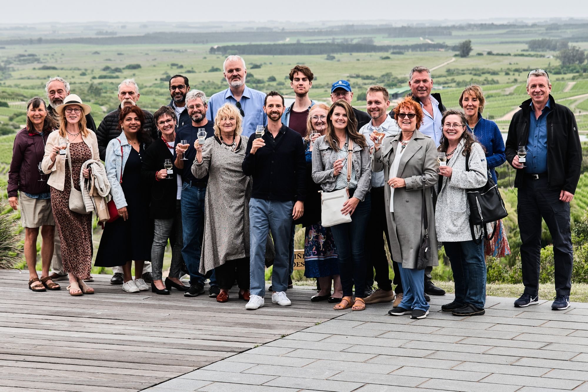 The Expat Money Community posing for a photo in front of a vineyard (1)